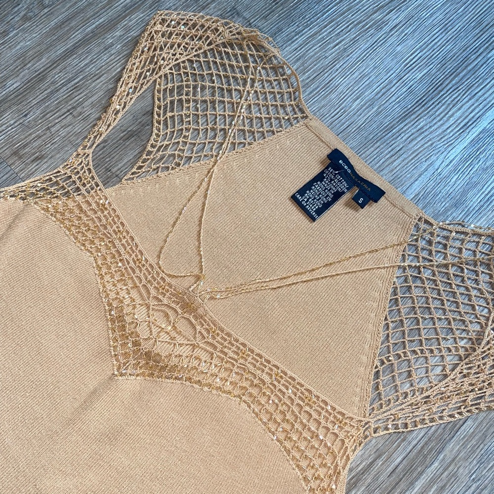 Stunning unique open weave top